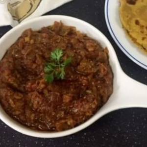 1/2 Baingan Bharta + 2 Missi Roti (Amul)