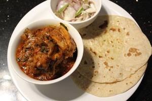 2 Pcs Chicken Gravy With 2 Tawa Butter Roti