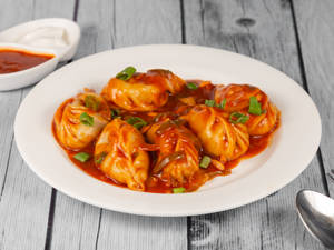 Veg Manchurian Flavoured Momos ( 6 Pcs )