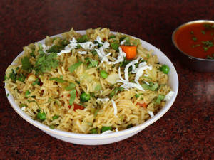 Veg Biryani with Curry And Raita