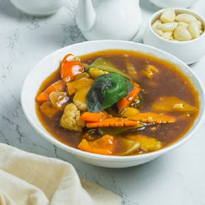 Schezwan Mixed Vegetables With Baby Corn And Button Mushroom