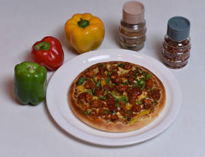 Chicken Ghee Roast Pizza