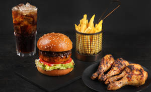 Single patty chicken burger With Fries, Drumsticks & Coke