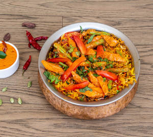 Urban Pind Special Veg Biryani Served With Gravy+ (rasbhari Jamun Rasgulla Box)