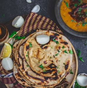 1/2 Dal Arhar Fry  (Amul) + 2 Tandoori Roti Butter (Amul)