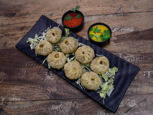 Veg Afghani Momos (8 Pcs) ( Red Chutney + Mayonnaise ) 