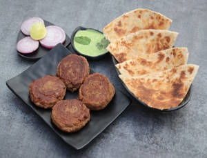 Chicken Galouti Kabab Ulta Tawa Combo ( 1 Plate Galouti Kabab (4 Pcs) + 2 Ulta Tawa Shahi Paratha)