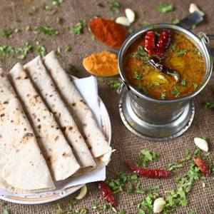 Dal Fry With 4  Tawa Butter Roti