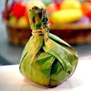 Chicken Kizhi Parota( Parota With Chiken Curry wrapped in banana leaf)