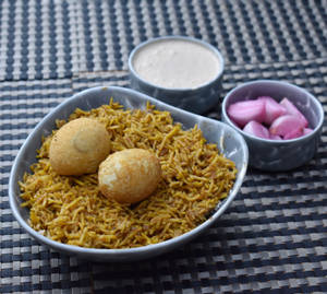 Egg Biryani + Raita + Gravy