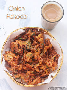 Ginger Milk Tea (500 Ml ) With Onion Pakora ( 8 Pcs )