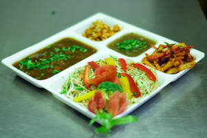 Chilli Potato + Manchow Soup + Noodles + Manchurian (4 Pcs) or Paneer Manchurian + Salad Combo      