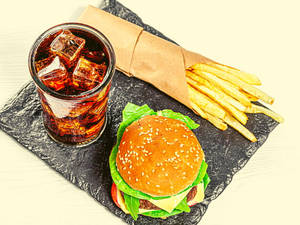 Veg Makhani Burger + French Fries + Coke (200 Ml)