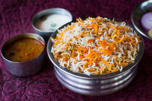 Hyderabadi Chicken Biryani Special (2 Chicken Pcs) +1 Egg +Raita