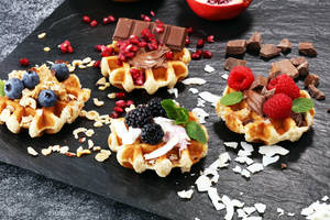 High Protein Waffle With Fruits And Granola Toppings