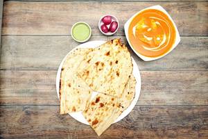 Shahi Paneer Served With Butter Naan