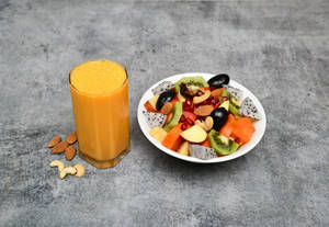 Seasonal Fresh Fruit Bowl With Badam Milk