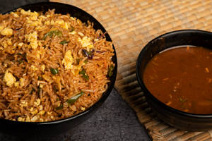 Schezwan Egg Fried Rice With With Plain Manchurian Sauce