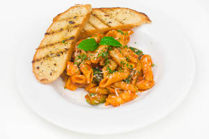 Penne Pasta Tossed in Spicy Tomato Sauce