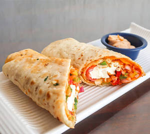 Paneer Roll Served With Tomato Ketchup