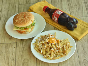 Veg Surprise Burger + Small Fries + Coke Mini Bottle