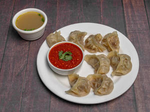 Chicken Steamed Momos (plate Of 8 Pcs)