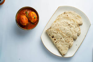Egg Curry + 4 Tawa Roti + Salad