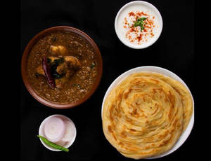 Malabar Parantha With Chicken Chettinad  