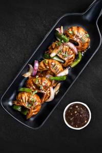 Chi. Wok Tossed Momos in Manchurian Sauce