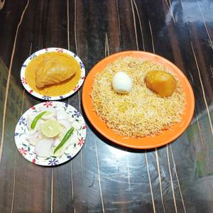 Egg Biryani with Chicken Chap Salad