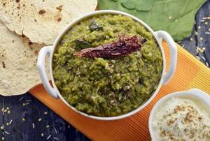 Palak Khichdi With Raita , Pickle & Papad