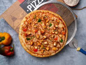 8 Slices Medium Fully Loaded Spicy Veggies Pizza(10inches)+ 200ml cool drink