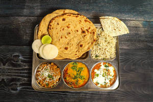 Veg Punjabi Thali + 1 Cold Drink (150ml)