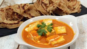 Shahi Paneer Served Wth Laccha Paratha