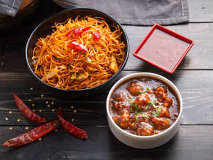 Veg Schezwan Noodles +  Cauliflower Manchurian