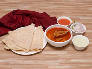 Mutton Korma(2 Pcs)+ 2 Rumali Roti               