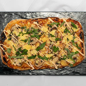 Sourdough Truffle Mushroom Pinsa Pizza Slice