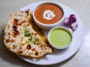 Stuffed naan with dal makhani