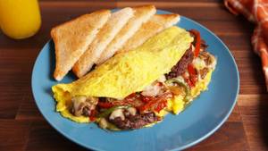 Chicken & Sausage Omelette With Cheese(served With 2 Slice Of Toasted Bread.