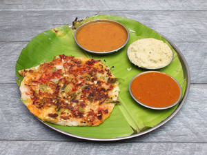 Vegetable Dosa (Served With White Chutney, Laal Chutney And Sambhar)