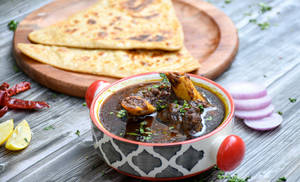 Dehati Mutton Curry With Paratha Or Rice