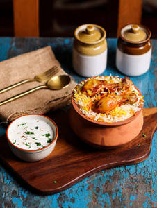 Murgh Dum Biryani (served With Raita)