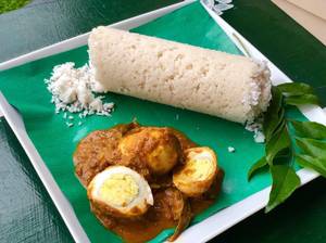 Rice Puttu With Egg Curry