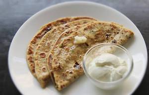 Aloo Paratha (2 Pcs) + Curd + Pickle.