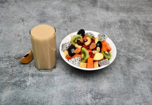 Seasonal Fresh Fruit Bowl With Sapota Juice