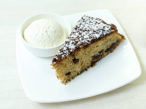 Apple Chocolate Cake Slice With One Scoop Vanilla