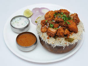 Rayala Vari Chicken Fry Piece Biryani [served with raita & salan]