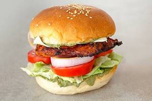 Chicken Tikka Burger(served with Tomato ketchup, Potato Chips)