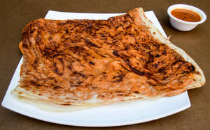 Egg Veechu Parotta (1 Pc)