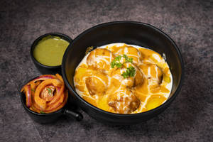 Exotic Vegetables Butter Masala Momo